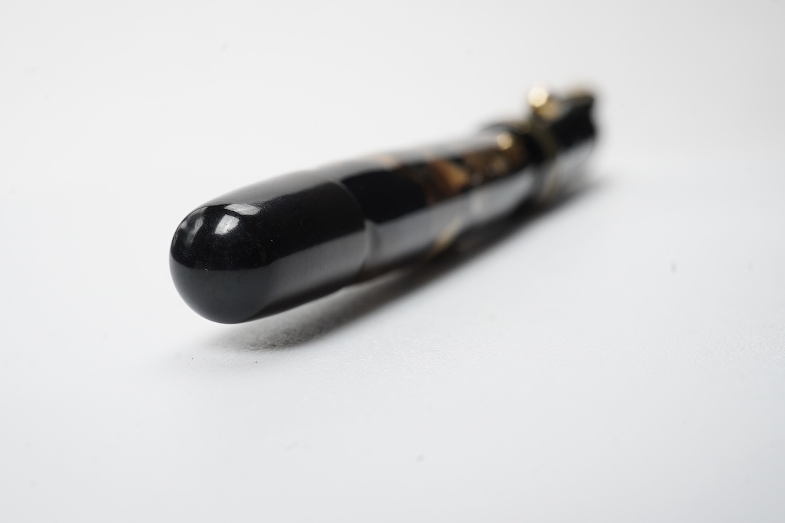 A rare Montblanc high top fountain pen in brown and black marble barrel with black cap